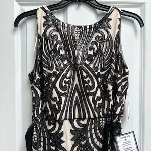 New with tages black sequin and nude gown/dress